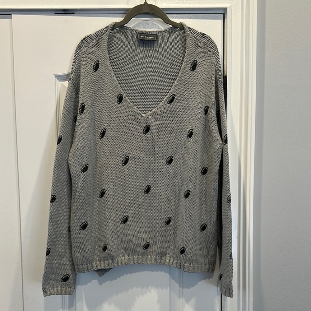 Gray Wooden Ships V-Neck Sweater with Black Football Accents